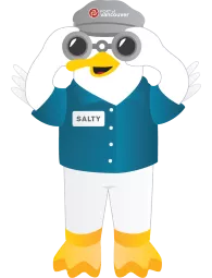 Salty, la mascotte, regarde à travers des jumelles Salty, la mascotte, regarde à travers des jumelles